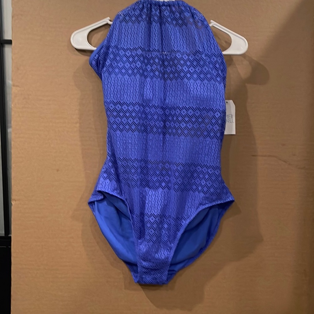 Blue swimsuit with laced up backing.